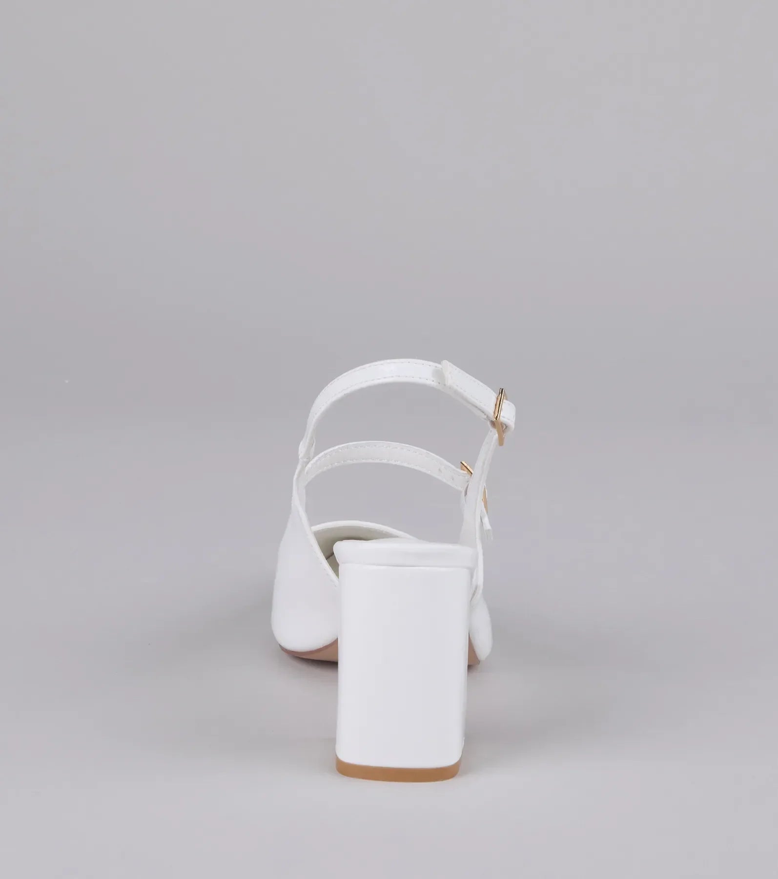 Style made simple with the Point Made Buckle Strap Sling-Back Pumps in white, trendy women’s shoes that take your outfit from basic to bold in one step.