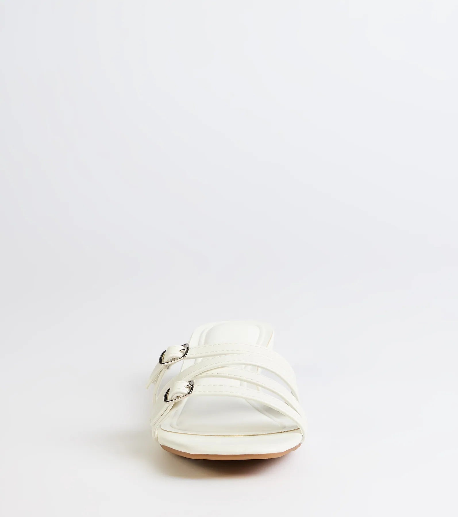 Style made simple with the Trendy Steps Buckle Strap Kitten Heel Mules in white, trendy women’s shoes that take your outfit from basic to bold in one step.