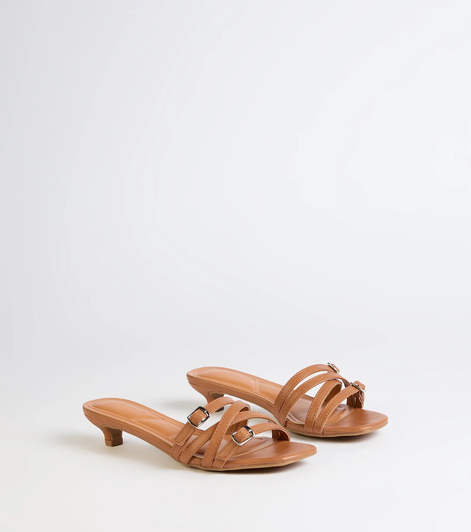 Style made simple with the Trendy Steps Buckle Strap Kitten Heel Mules in camel brown, trendy women’s shoes that take your outfit from basic to bold in one step.