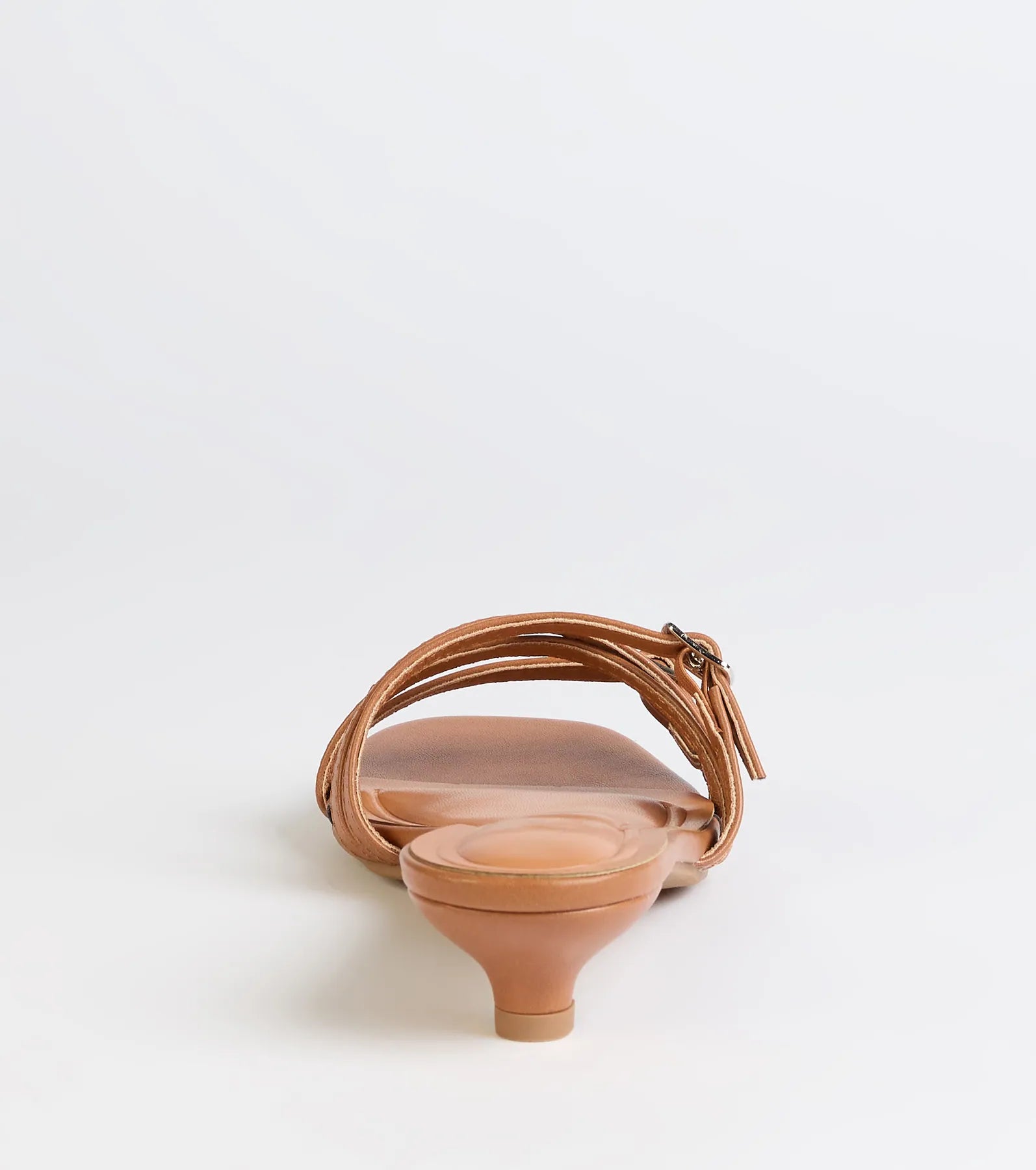 Turn heads in the Trendy Steps Buckle Strap Kitten Heel Mules, camel brown heels showcasing a fresh trend or stylish detail made to elevate your full Windsor fit.