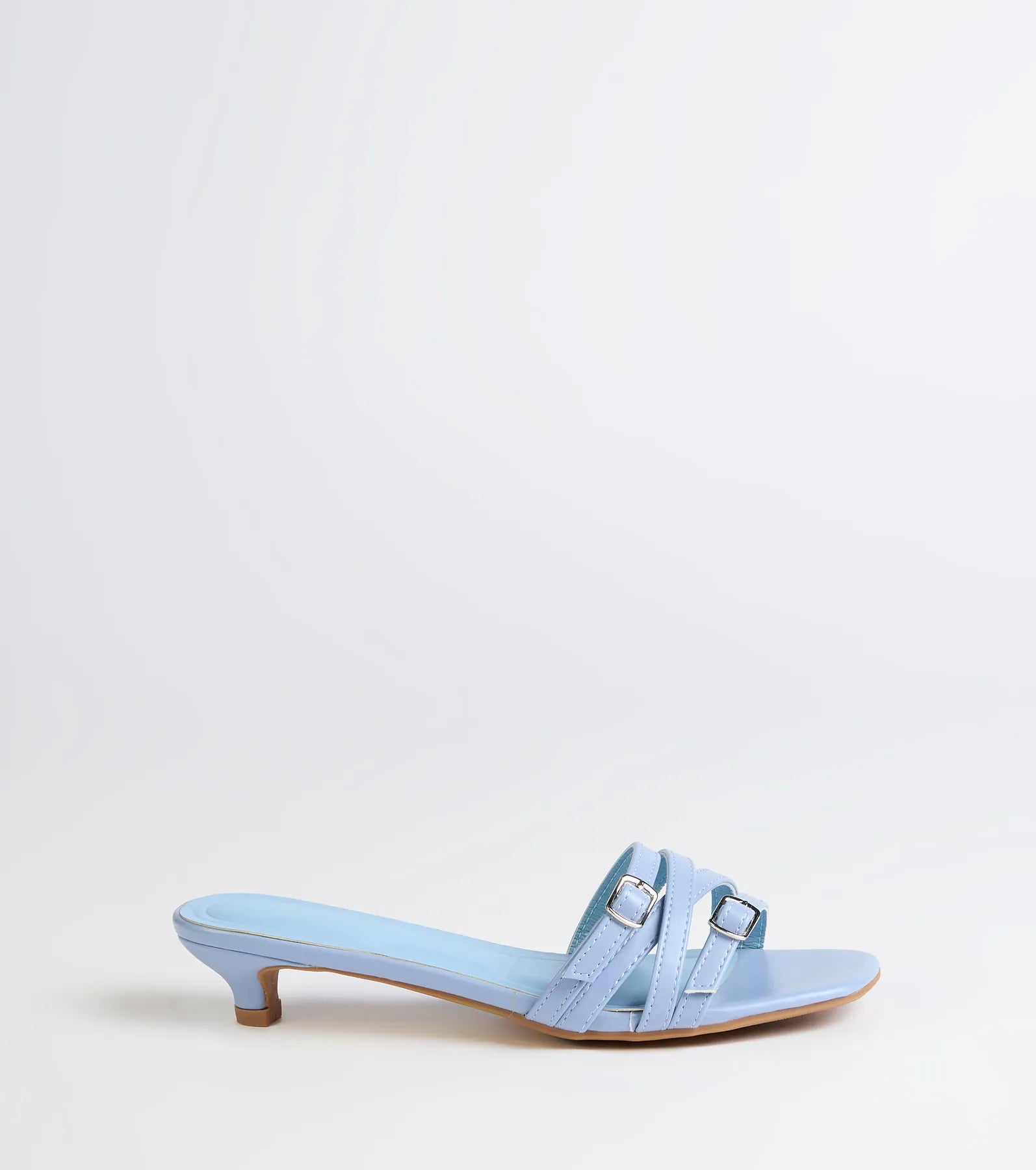 Turn heads in the Trendy Steps Buckle Strap Kitten Heel Mules, blue heels showcasing a fresh trend or stylish detail made to elevate your full Windsor fit.