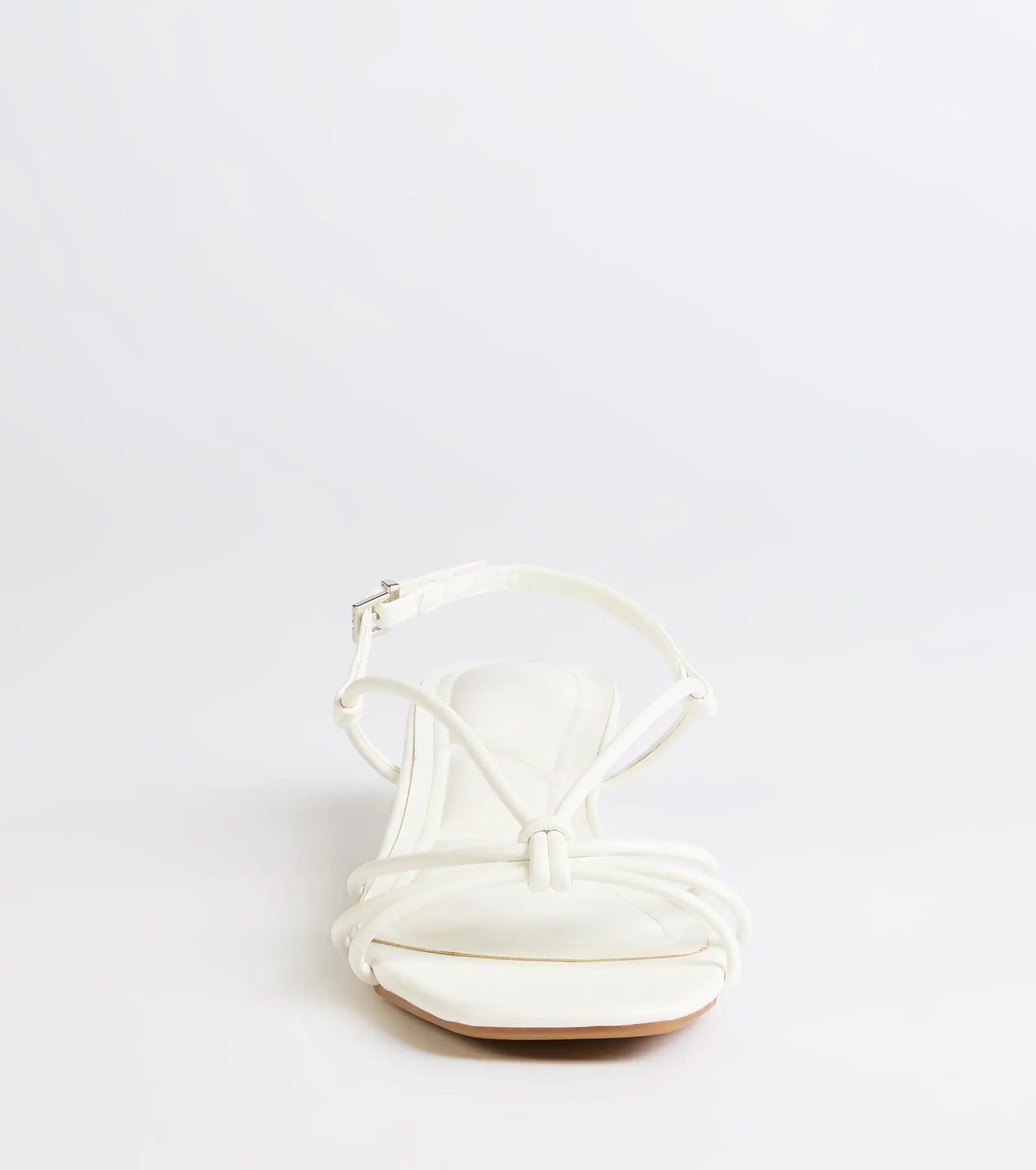 Style made simple with the Tied Together Strappy Kitten Heels in white, trendy women’s shoes that take your outfit from basic to bold in one step.