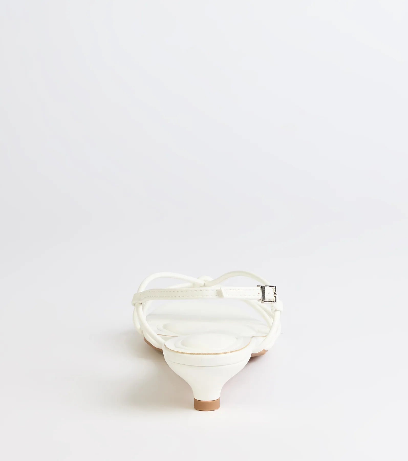 Turn heads in the Tied Together Strappy Kitten Heels, white heels showcasing a fresh trend or stylish detail made to elevate your full Windsor fit.