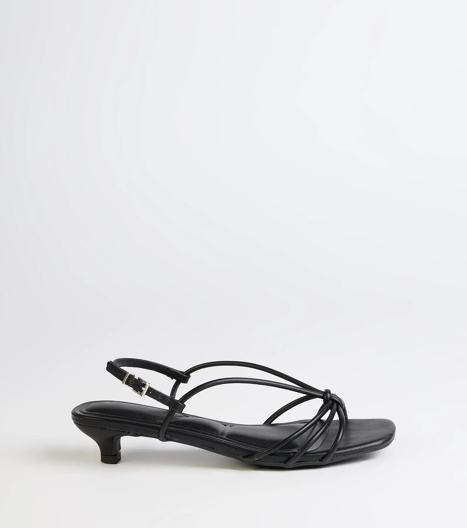 Turn heads in the Tied Together Strappy Kitten Heels, black heels showcasing a fresh trend or stylish detail made to elevate your full Windsor fit.