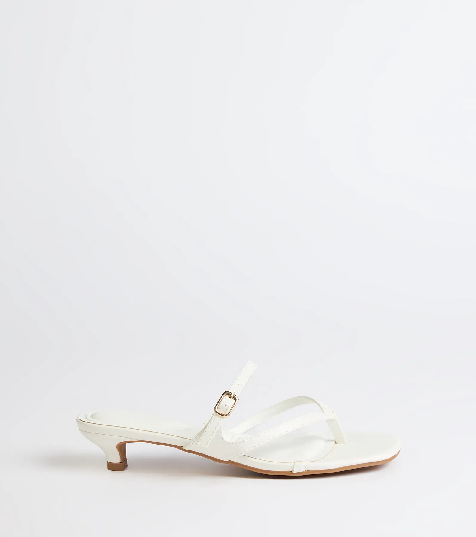 Elevate warm-weather looks with Chic Trend Thong Strap Kitten Heel Mules in white, a pair of trendy sandals bringing chic, modern flair to every step.