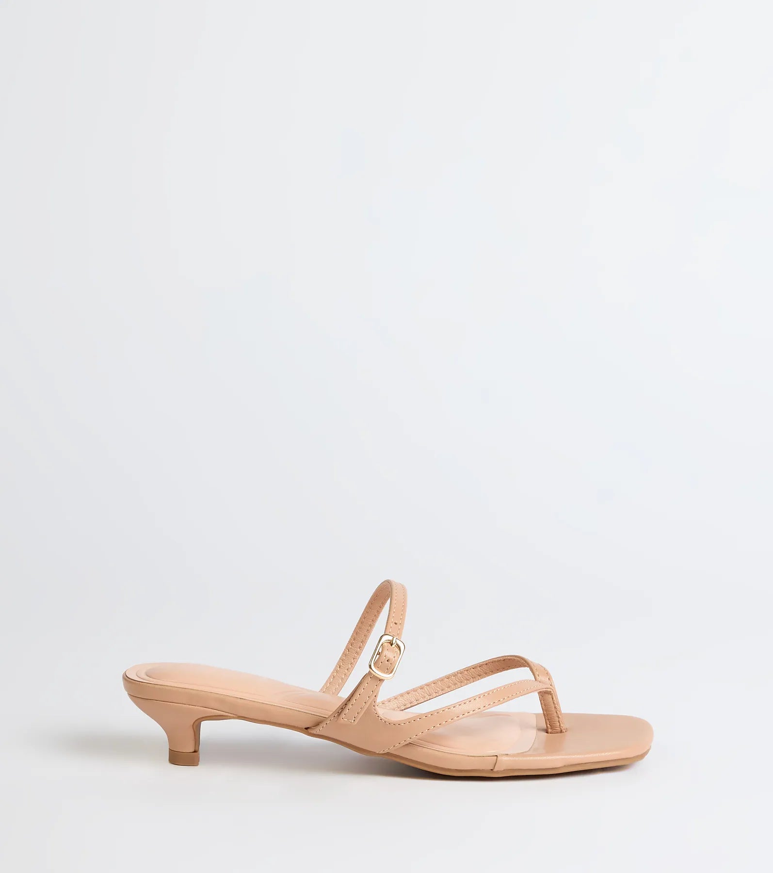 Elevate warm-weather looks with Chic Trend Thong Strap Kitten Heel Mules in nude, a pair of trendy sandals bringing chic, modern flair to every step.