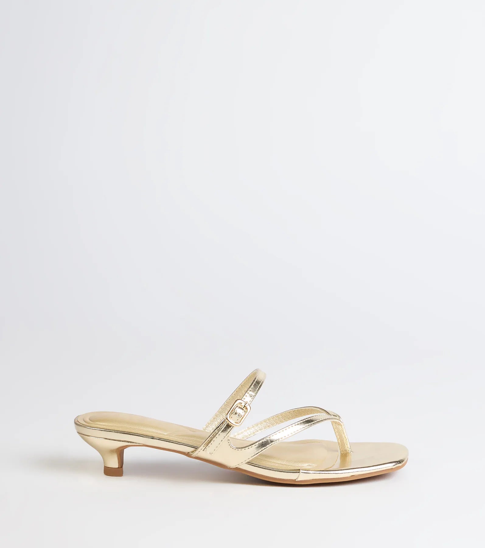 Elevate warm-weather looks with Chic Trend Thong Strap Kitten Heel Mules in gold, a pair of trendy sandals bringing chic, modern flair to every step.