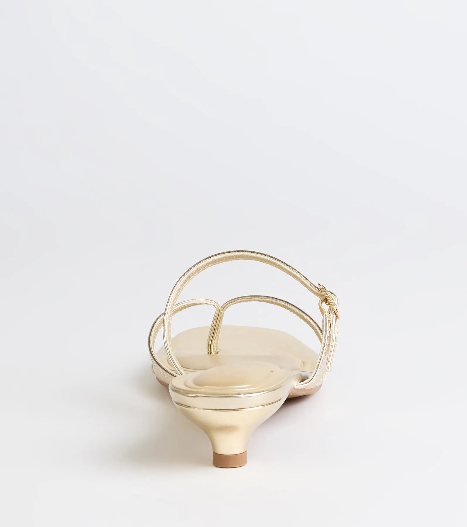 Elevate warm-weather looks with Chic Trend Thong Strap Kitten Heel Mules in gold, a pair of trendy sandals bringing chic, modern flair to every step.