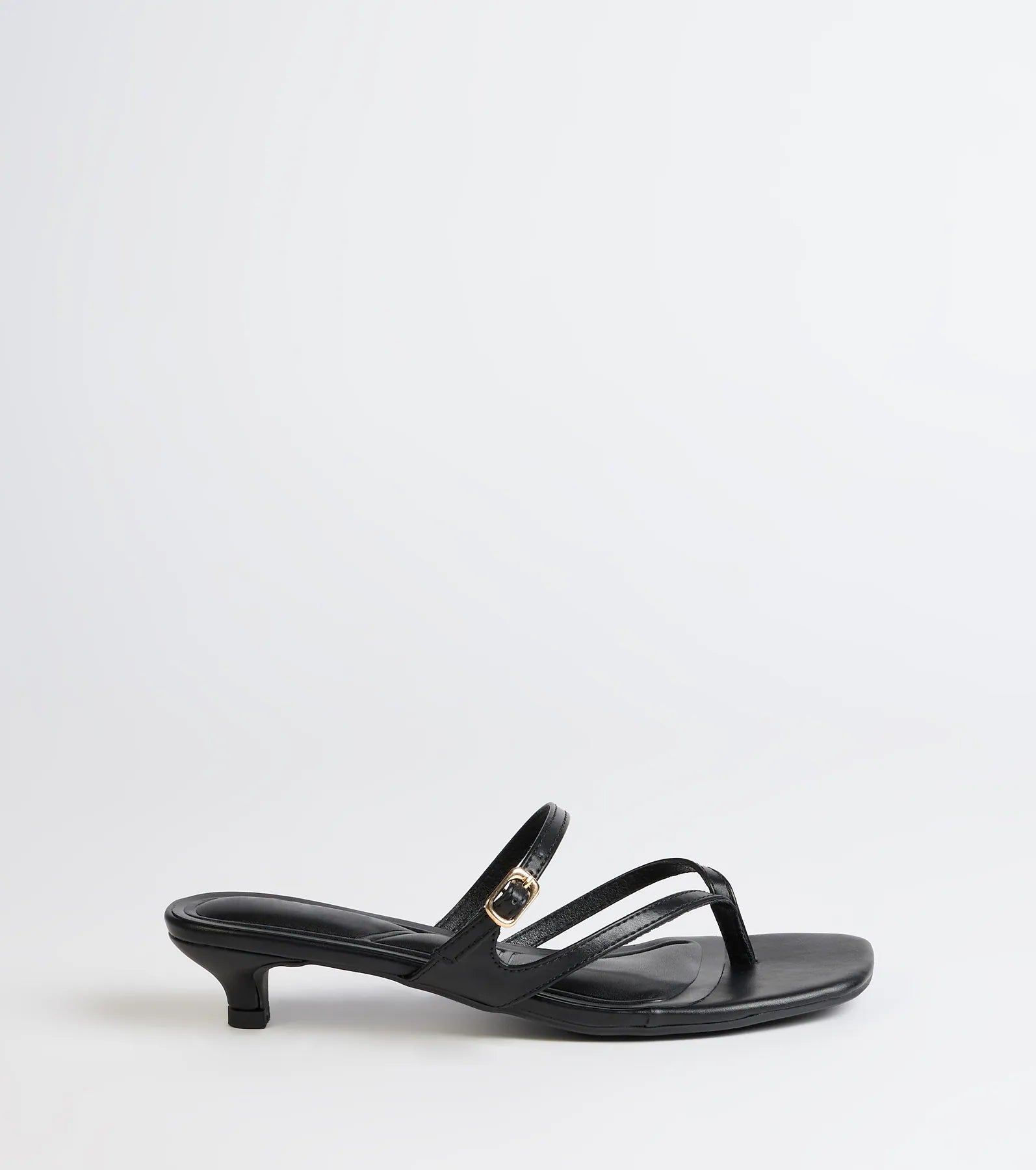 Elevate warm-weather looks with Chic Trend Thong Strap Kitten Heel Mules in black, a pair of trendy sandals bringing chic, modern flair to every step.