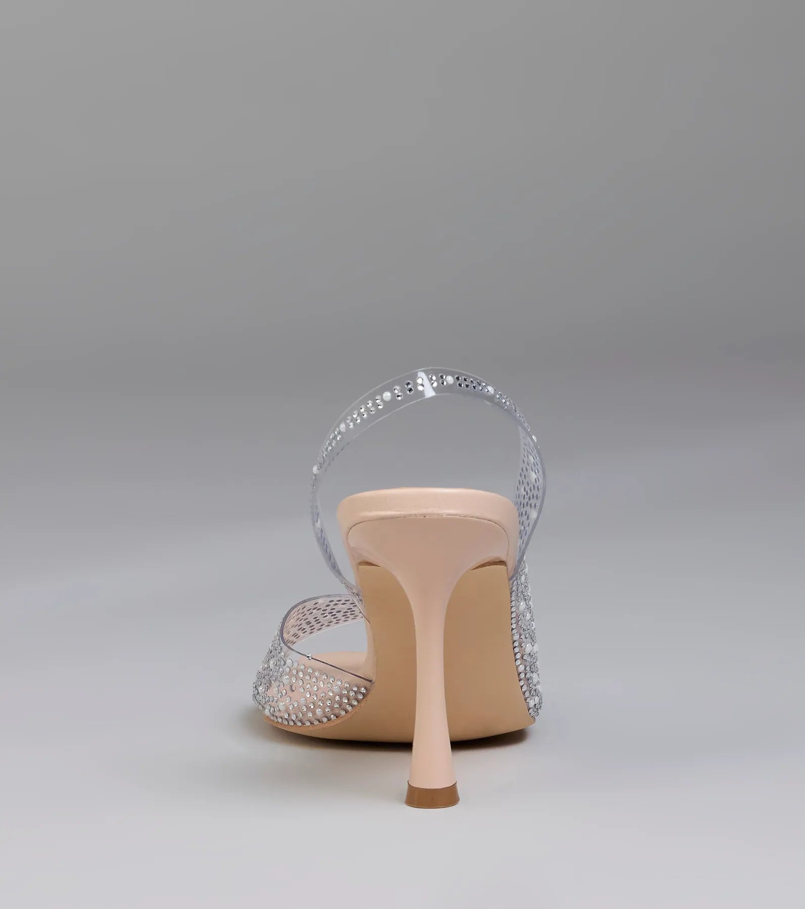 Turn heads in the Clear Goals Rhinestone Pearl Slingback Pumps, clear heels showcasing a fresh trend or stylish detail made to elevate your full Windsor fit.