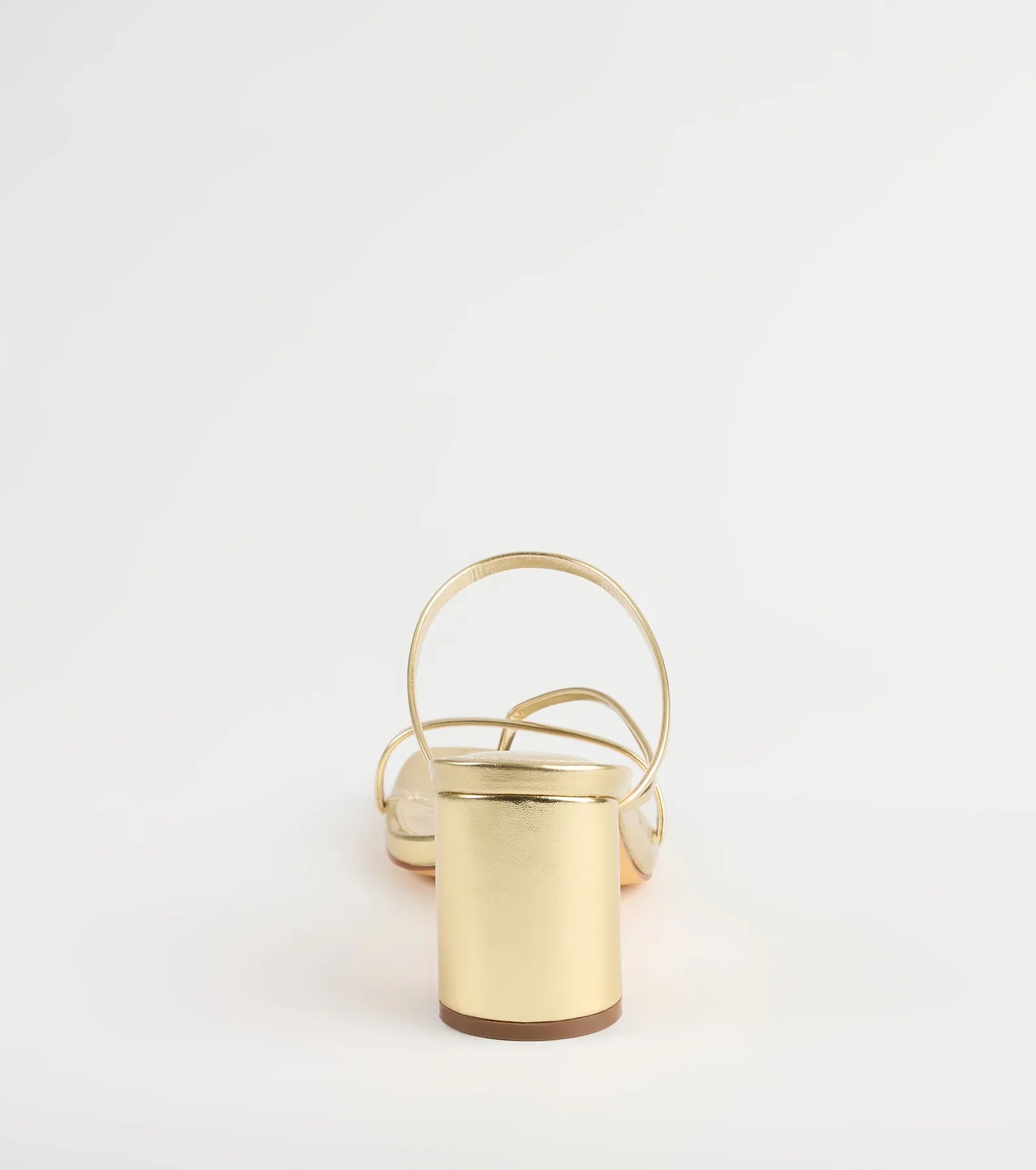 Style made simple with the So Much Personality Strappy Block Heels in gold, trendy women’s shoes that take your outfit from basic to bold in one step.