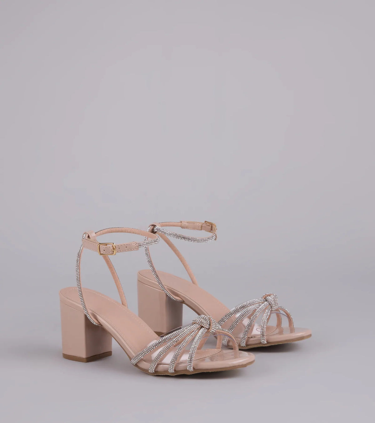 Style made simple with the Sparkle Agenda Rhinestone Strappy Block Heels in nude, trendy women’s shoes that take your outfit from basic to bold in one step.