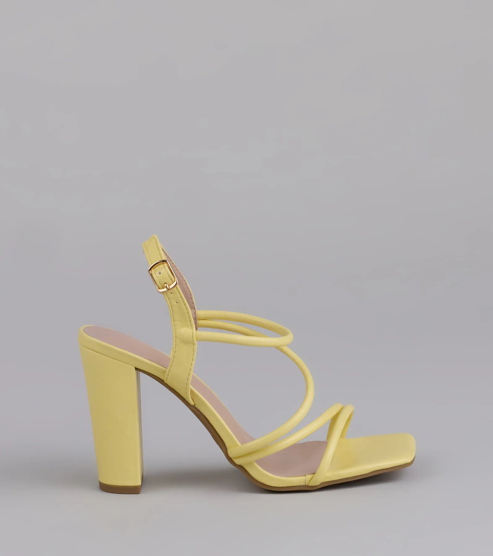 Style made simple with the Flirt Mode Activated Strappy Block Heels in yellow, trendy women’s shoes that take your outfit from basic to bold in one step.