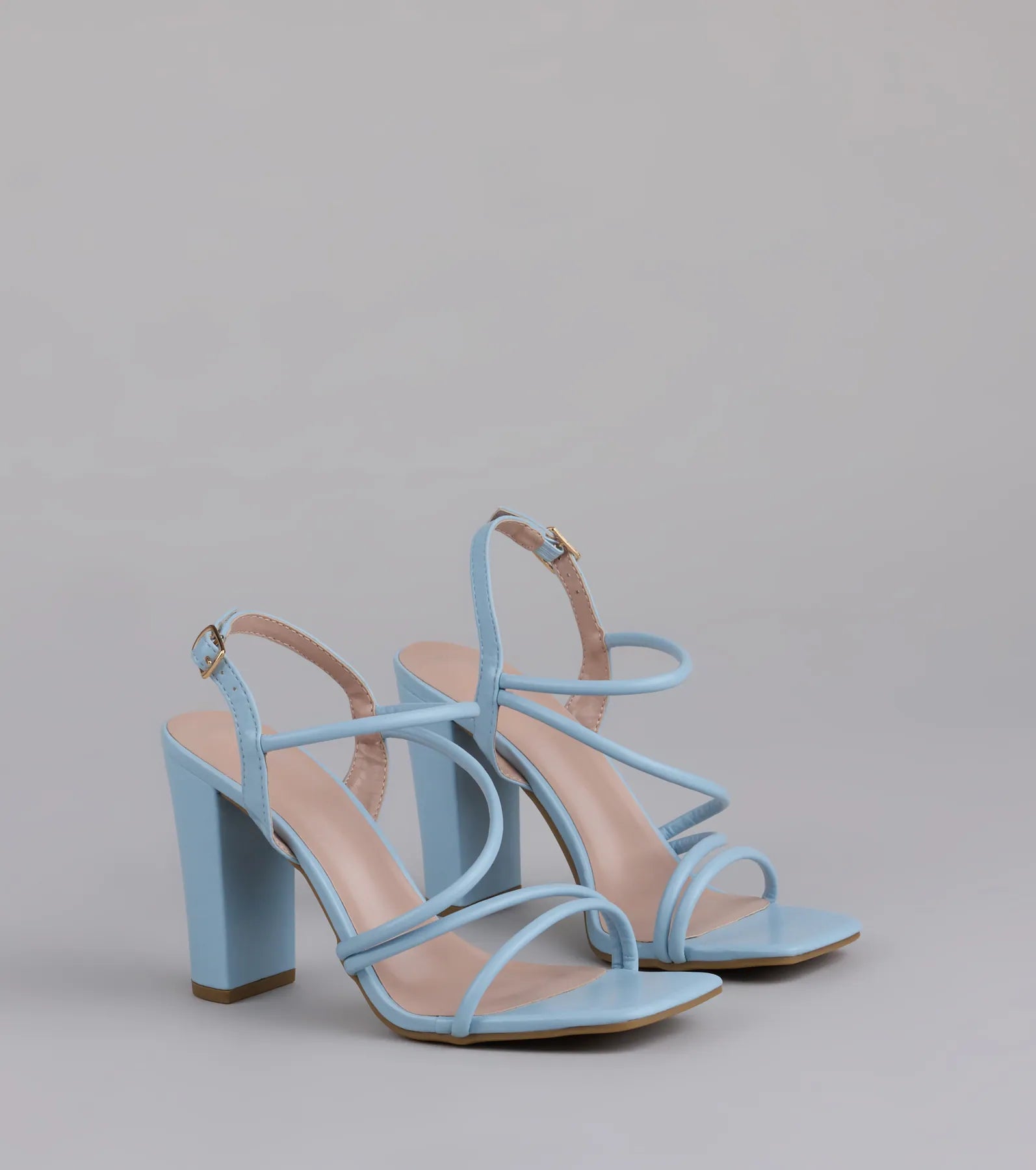 Style made simple with the Flirt Mode Activated Strappy Block Heels in light blue, trendy women’s shoes that take your outfit from basic to bold in one step.