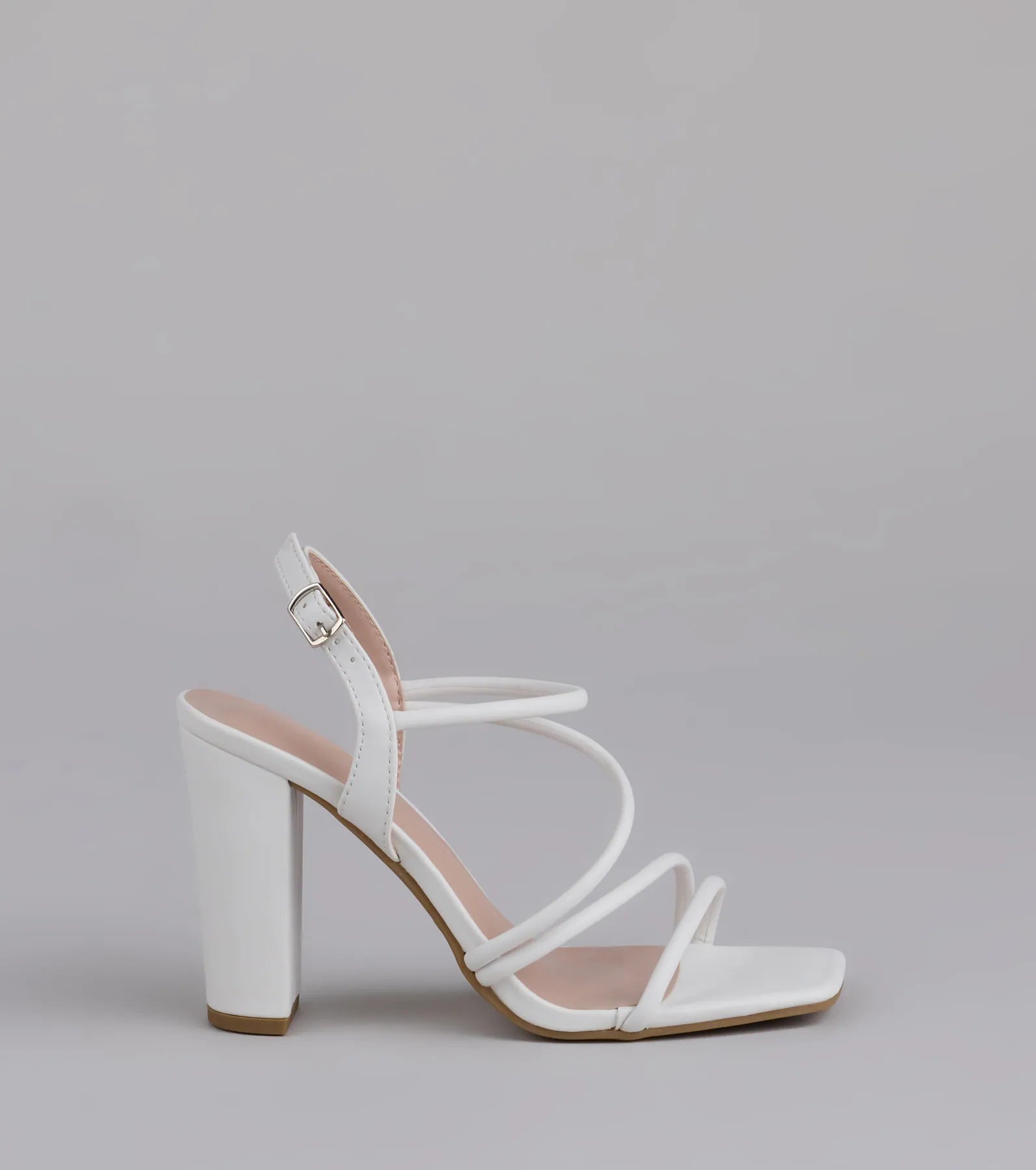 Style made simple with the Flirt Mode Activated Strappy Block Heels in white, trendy women’s shoes that take your outfit from basic to bold in one step.