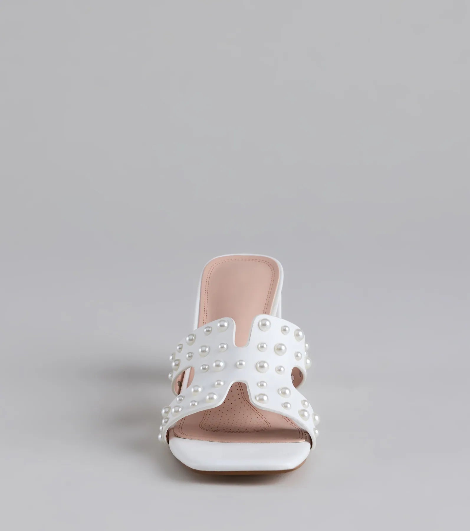 Style made simple with the Playful Poise Pearl Block Heel Mules in white, trendy women’s shoes that take your outfit from basic to bold in one step.