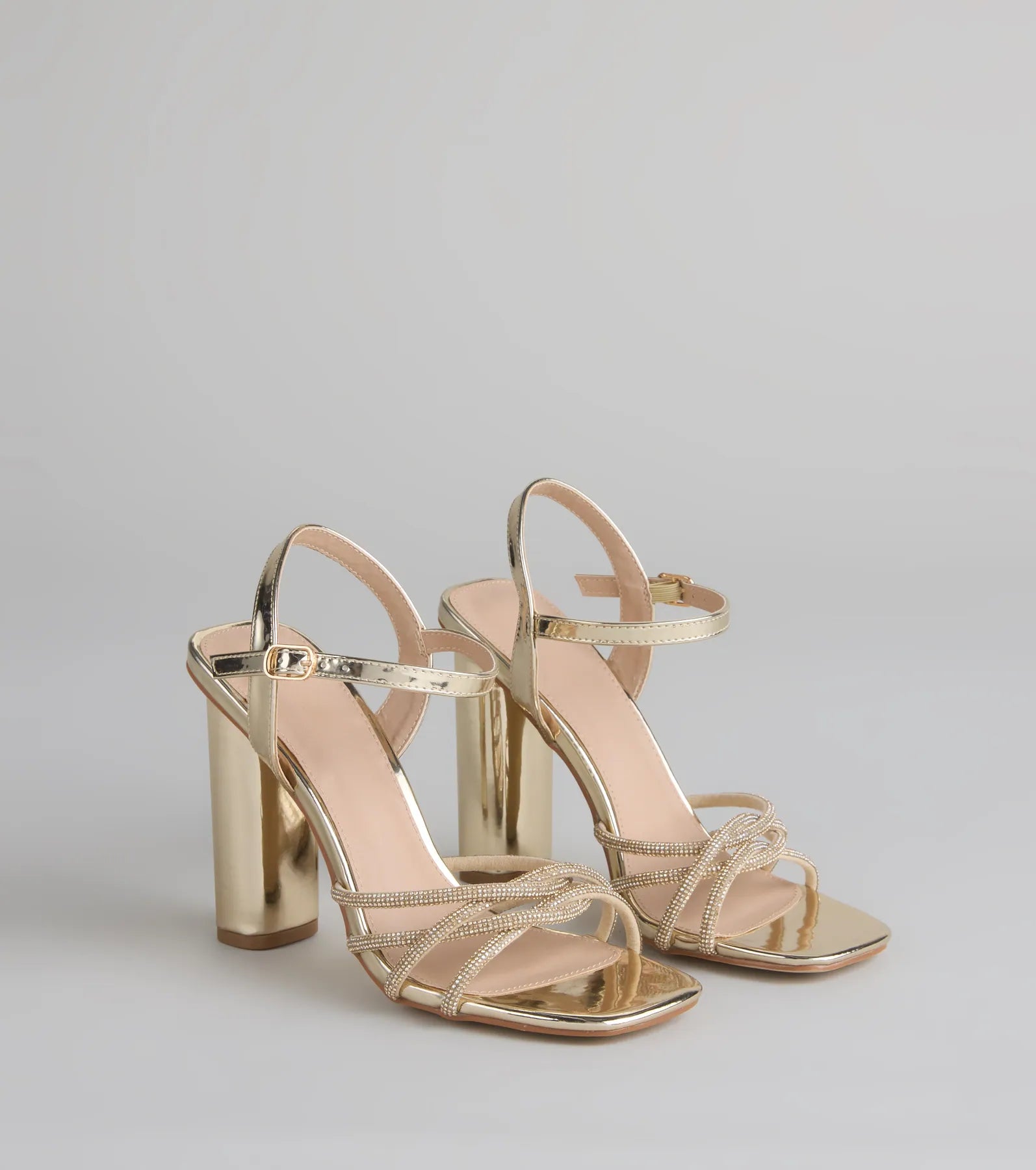 Style made simple with the Glow Getter Twisted Rhinestone Heels in gold, trendy women’s shoes that take your outfit from basic to bold in one step.