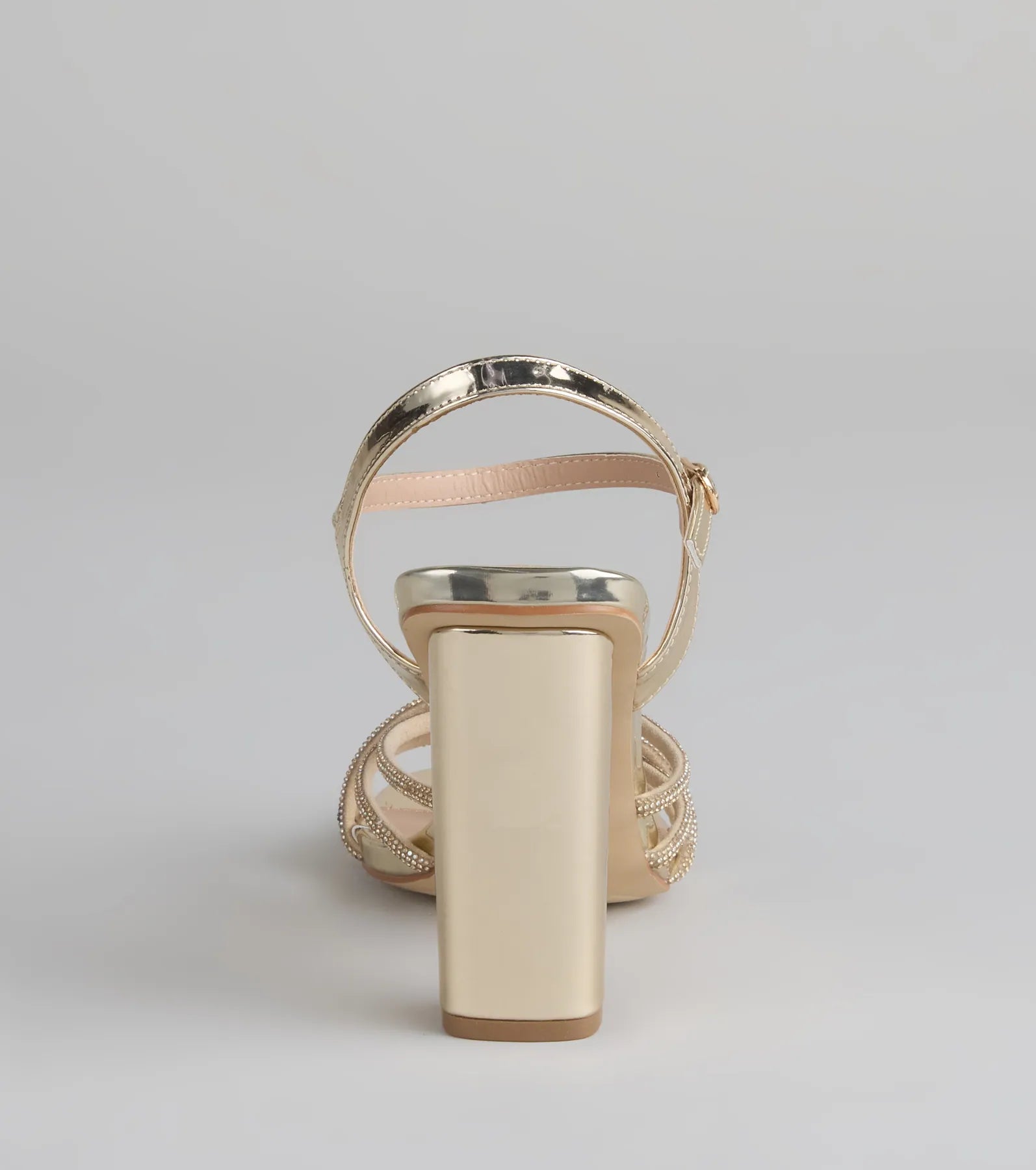 Style made simple with the Glow Getter Twisted Rhinestone Heels in gold, trendy women’s shoes that take your outfit from basic to bold in one step.