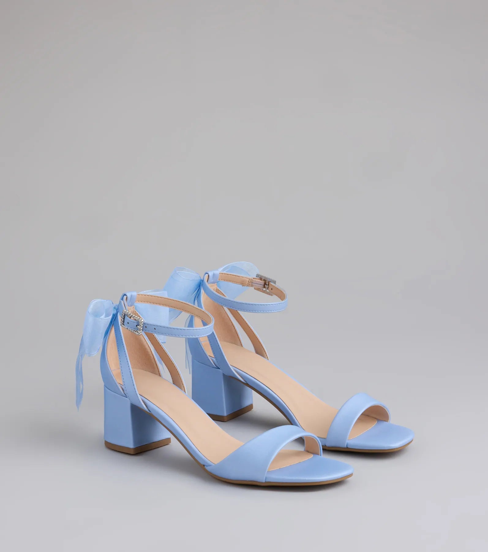 Step into style with the So Pretty Chiffon Bow Satin Block Heels, blue heels made to complete your Windsor look with comfort and glam in mind.