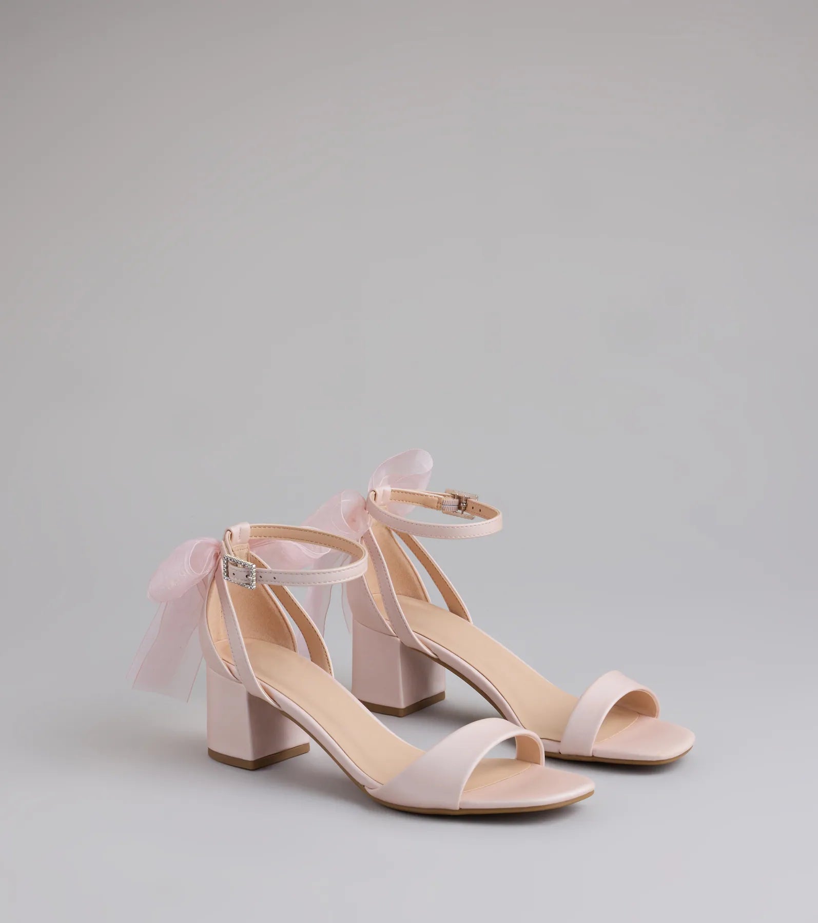Step into style with the So Pretty Chiffon Bow Satin Block Heels, pink heels made to complete your Windsor look with comfort and glam in mind.