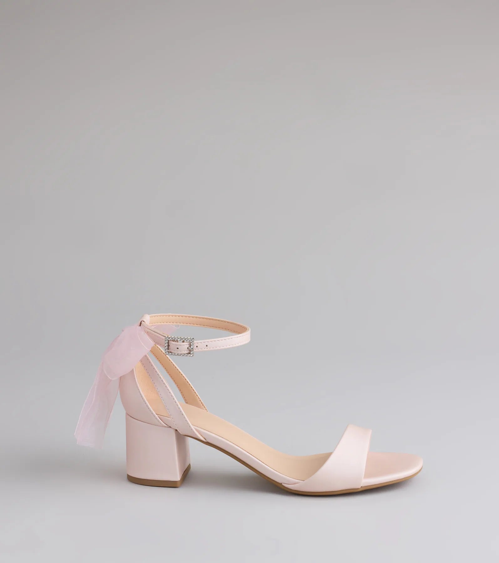 Elevate warm-weather looks with So Pretty Chiffon Bow Satin Block Heels in pink, a pair of trendy sandals bringing chic, modern flair to every step.