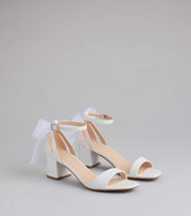 Step into style with the So Pretty Chiffon Bow Satin Block Heels, white heels made to complete your Windsor look with comfort and glam in mind.