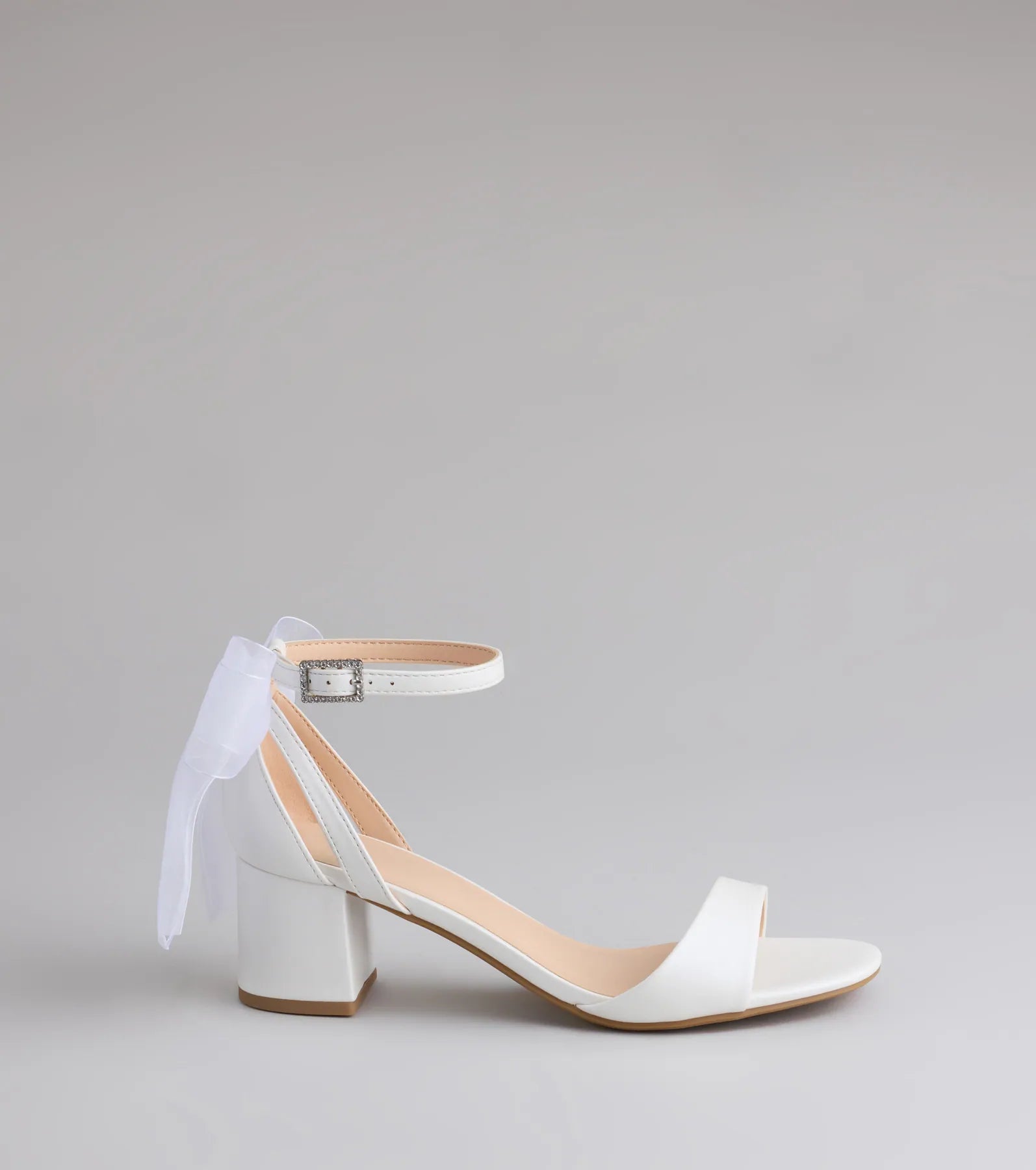 Elevate warm-weather looks with So Pretty Chiffon Bow Satin Block Heels in white, a pair of trendy sandals bringing chic, modern flair to every step.