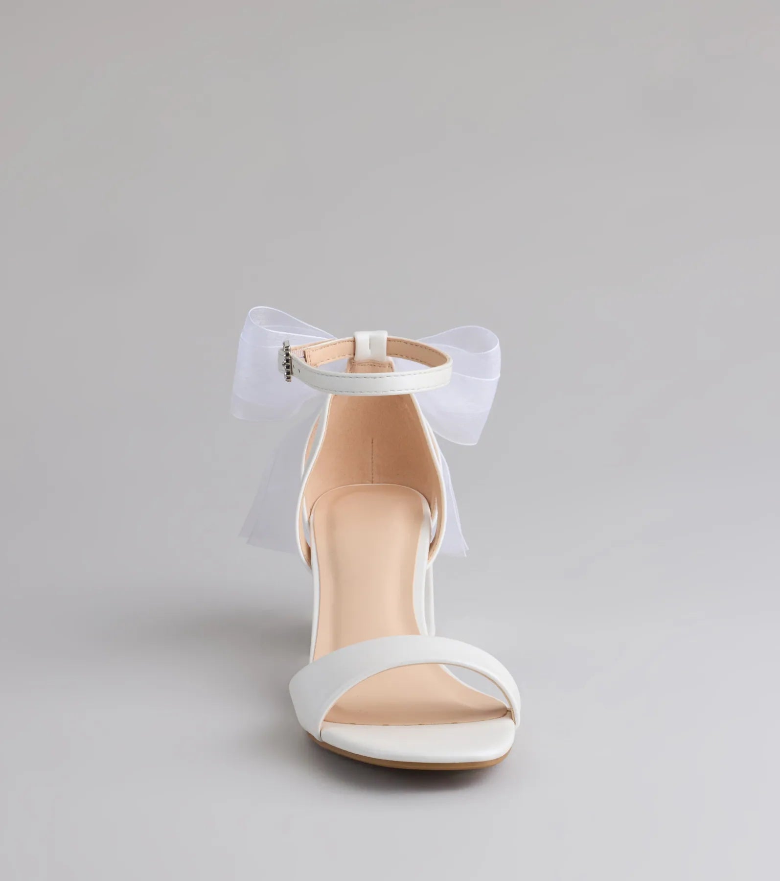 Turn heads in the So Pretty Chiffon Bow Satin Block Heels, white heels showcasing a fresh trend or stylish detail made to elevate your full Windsor fit.
