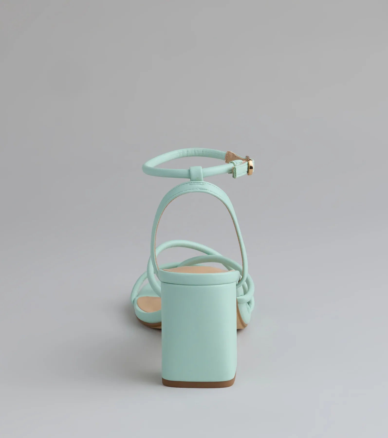 Elevate warm-weather looks with Chic Favorite Strappy Block Heels in mint green, a pair of trendy sandals bringing chic, modern flair to every step.