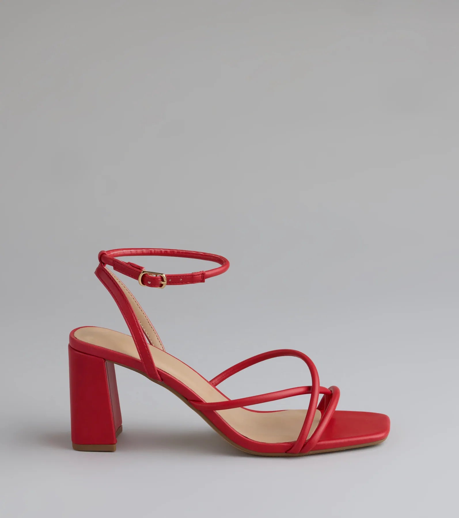 Elevate warm-weather looks with Chic Favorite Strappy Block Heels in red, a pair of trendy sandals bringing chic, modern flair to every step.