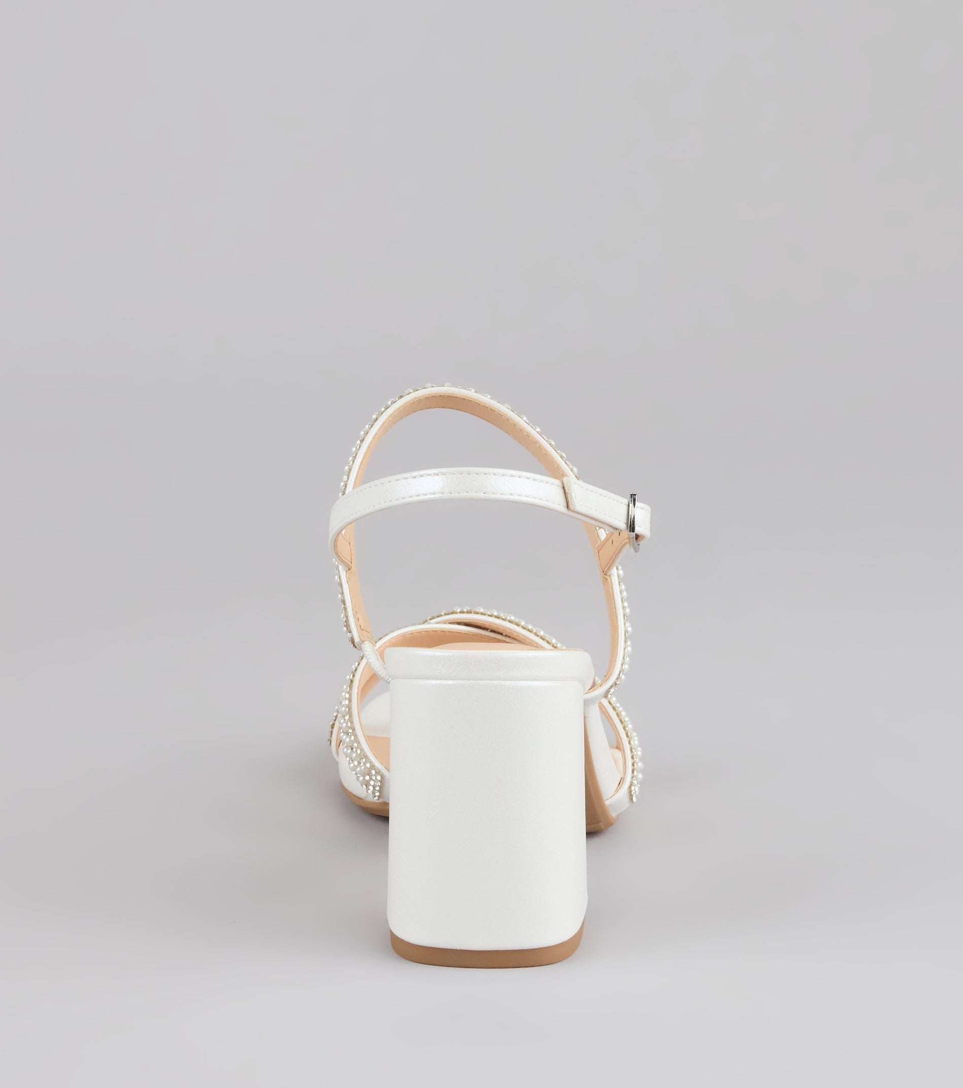 Style made simple with the Shine All Night Pearl Rhinestone Block Heels, trendy women’s shoes that take your outfit from basic to bold in one step.