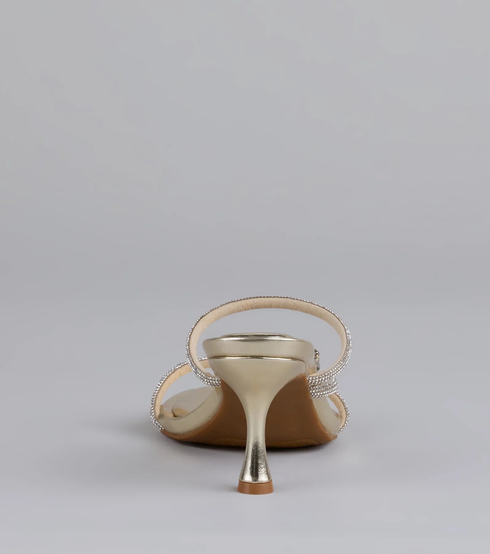 Style made simple with the Butterfly Kisses Rhinestone Metallic Heels in gold, trendy women’s shoes that take your outfit from basic to bold in one step.