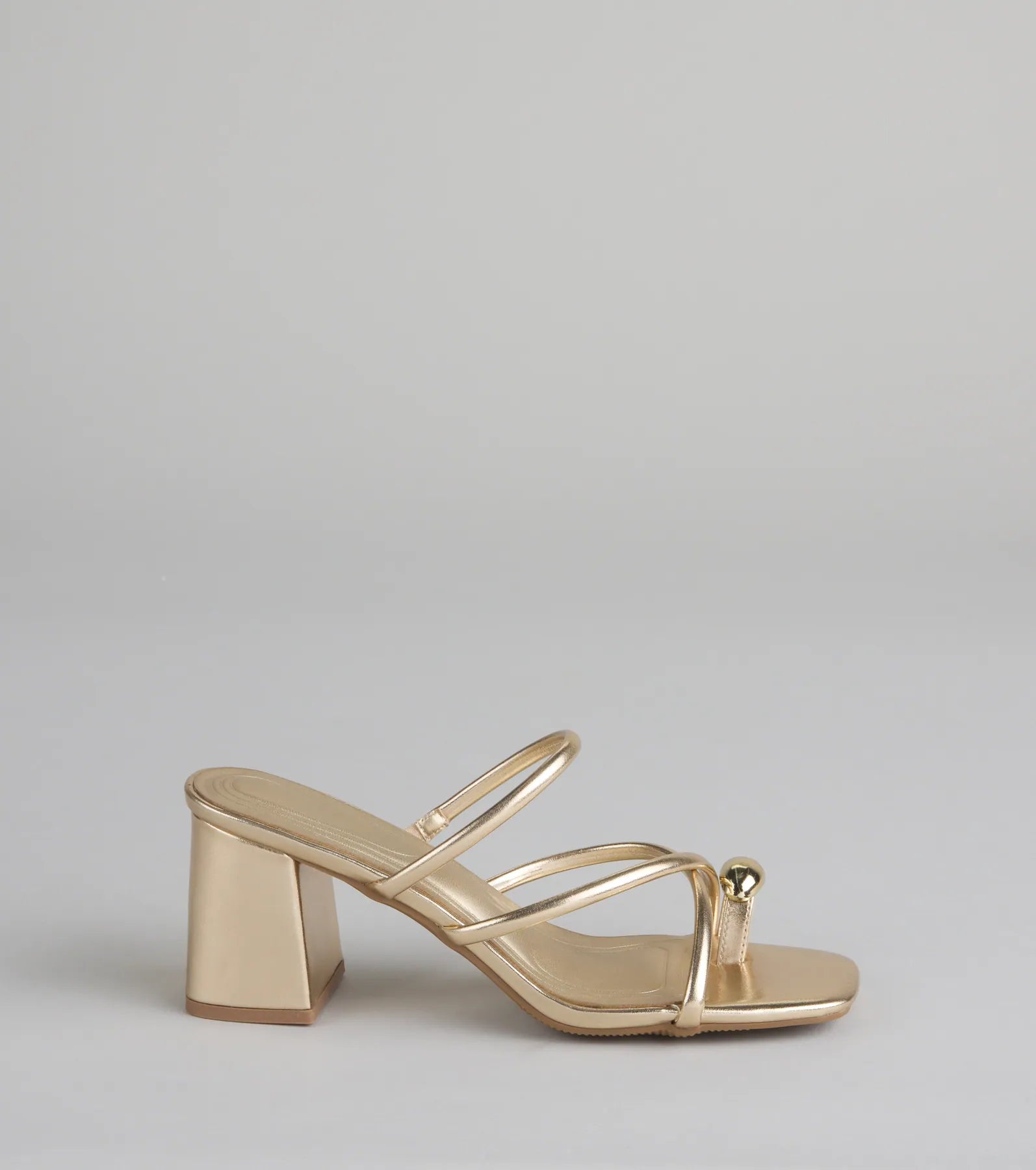 Style made simple with the Walking Pretty Toe Ring Heels in gold, trendy women’s shoes that take your outfit from basic to bold in one step.