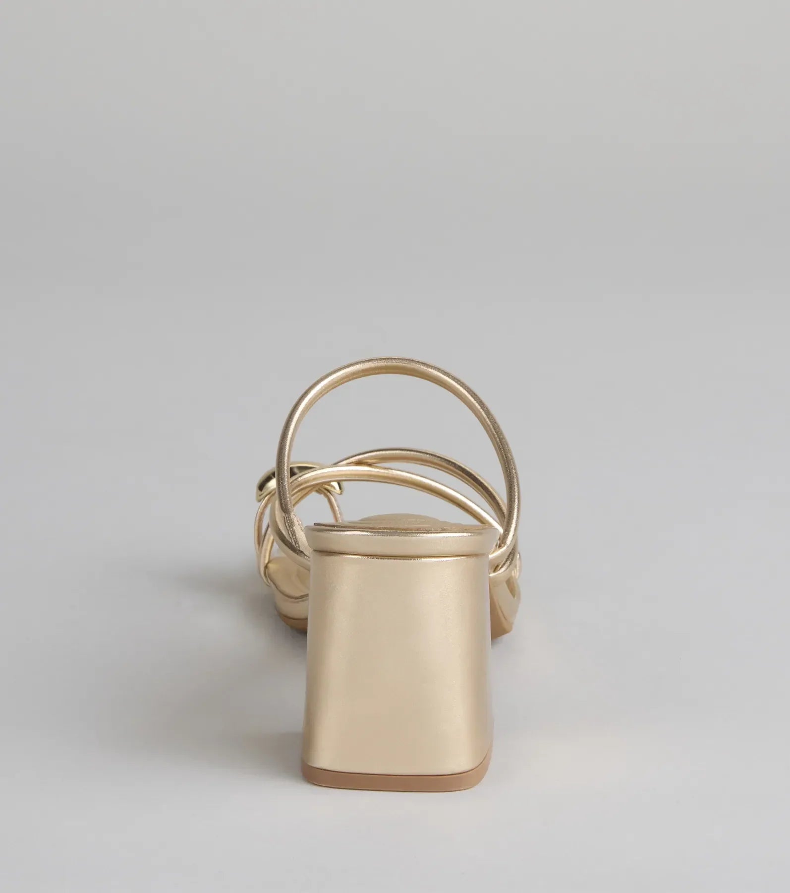 Style made simple with the Walking Pretty Toe Ring Heels in gold, trendy women’s shoes that take your outfit from basic to bold in one step.