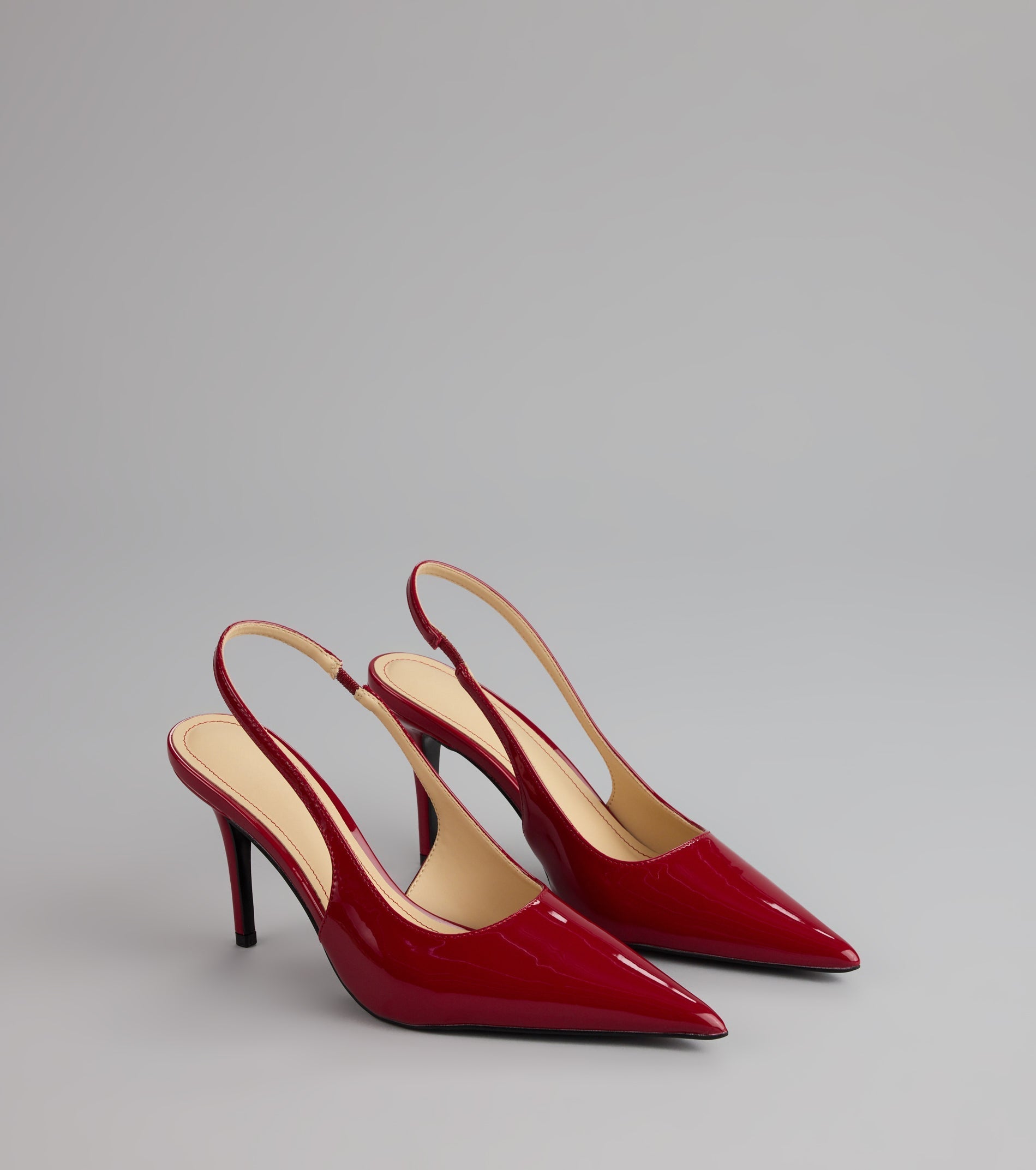 Style made simple with the Sharp Finish Patent Slingback Pumps, trendy women’s shoes that take your outfit from basic to bold in one step.