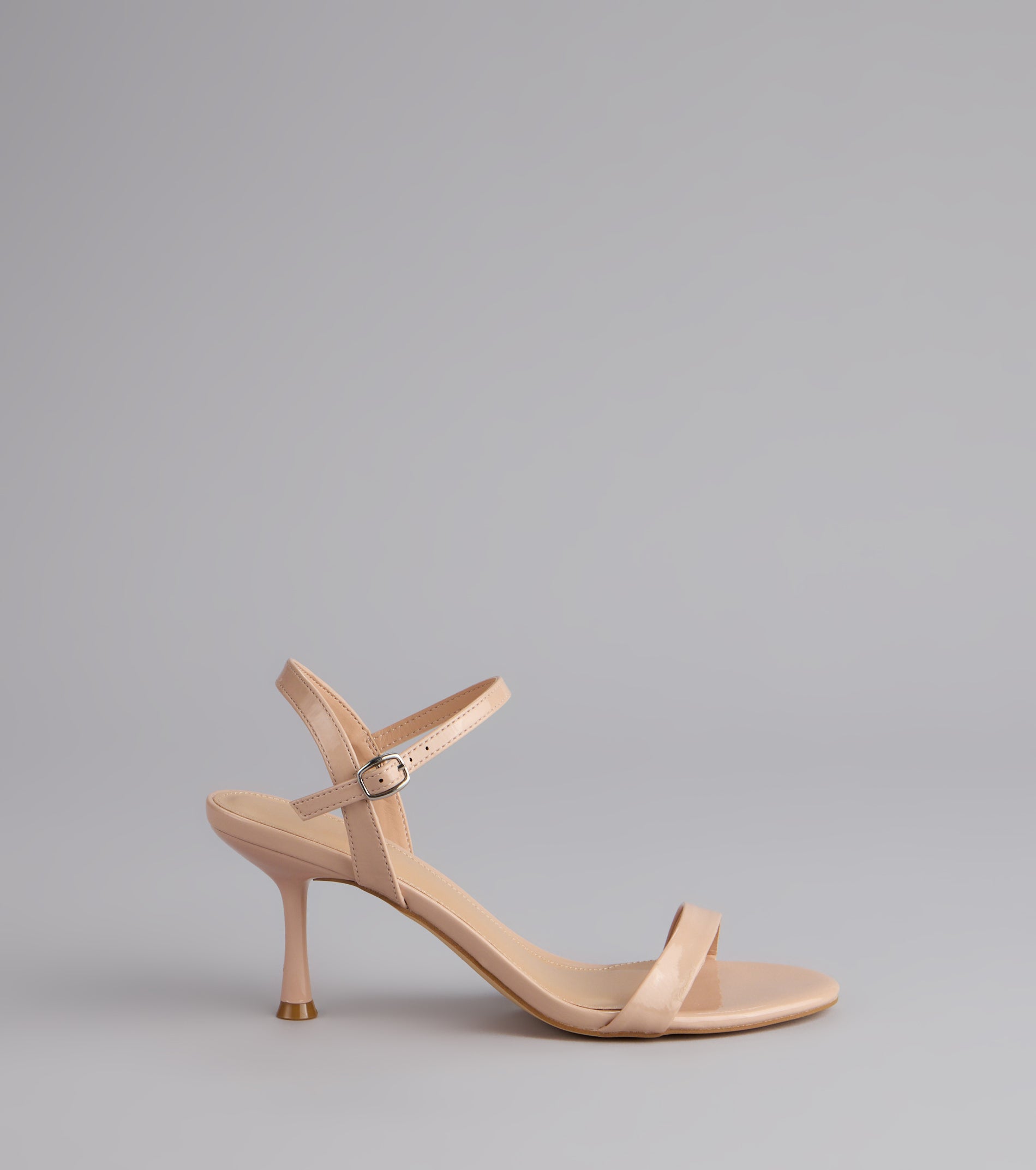 Style made simple with the Sleek And Simple Patent Kitten Heels, trendy women’s shoes that take your outfit from basic to bold in one step.