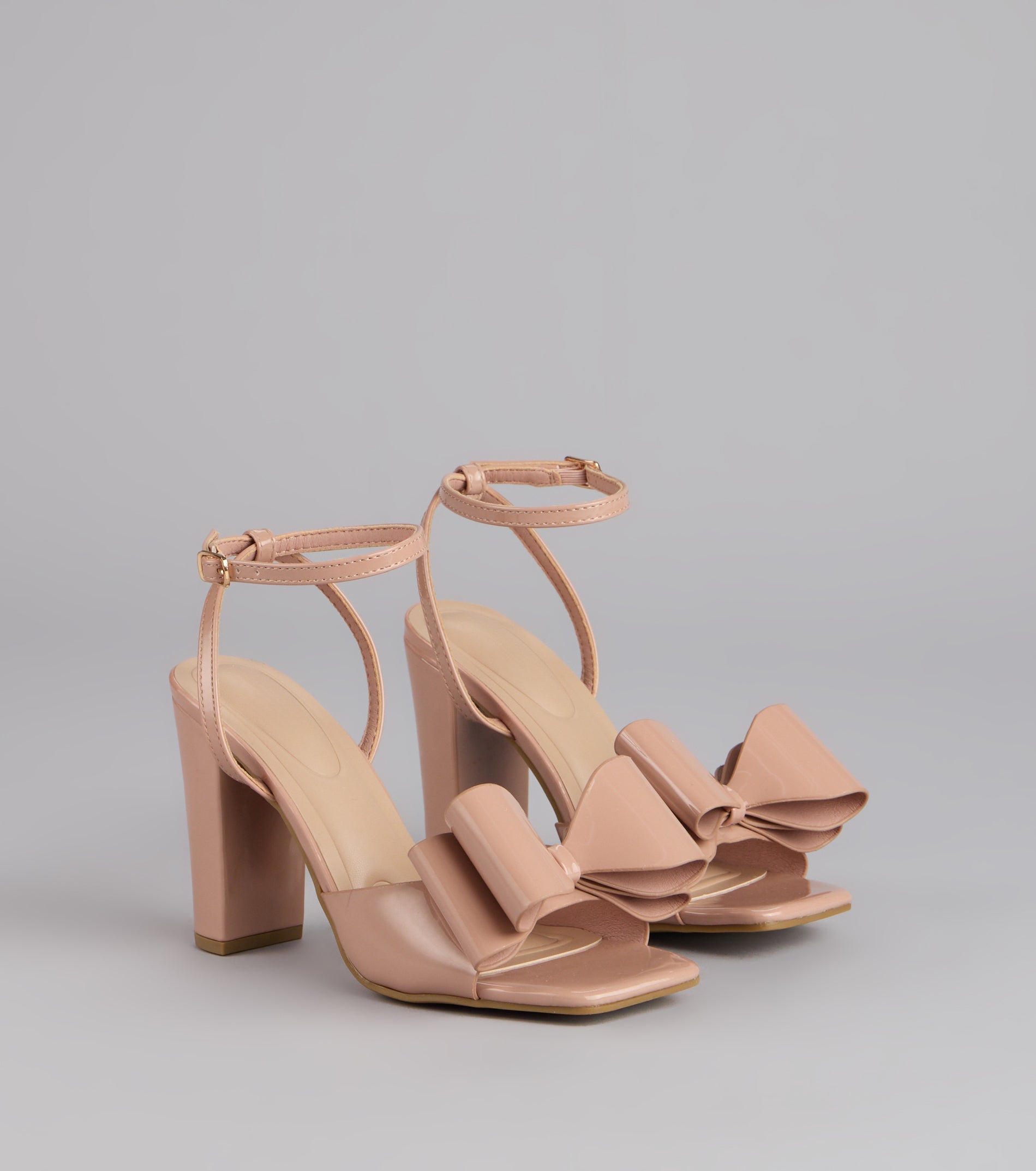 Style made simple with the Make A Statement Bow Block Heels, trendy women’s shoes that take your outfit from basic to bold in one step.