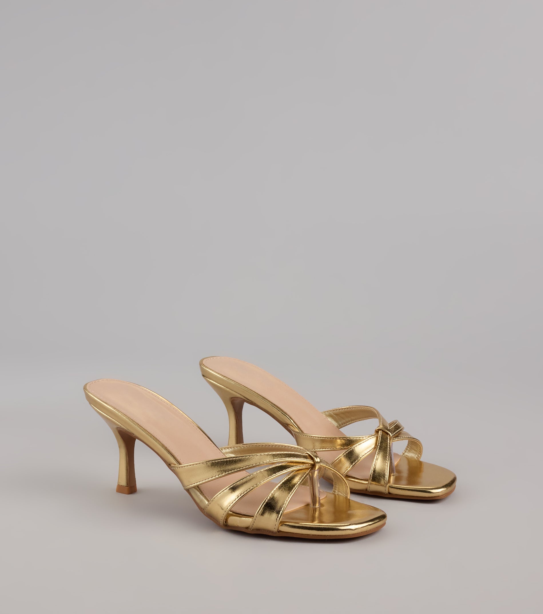 Style made simple with the Shine Bright Metallic Thong Kitten Heels, trendy women’s shoes that take your outfit from basic to bold in one step.