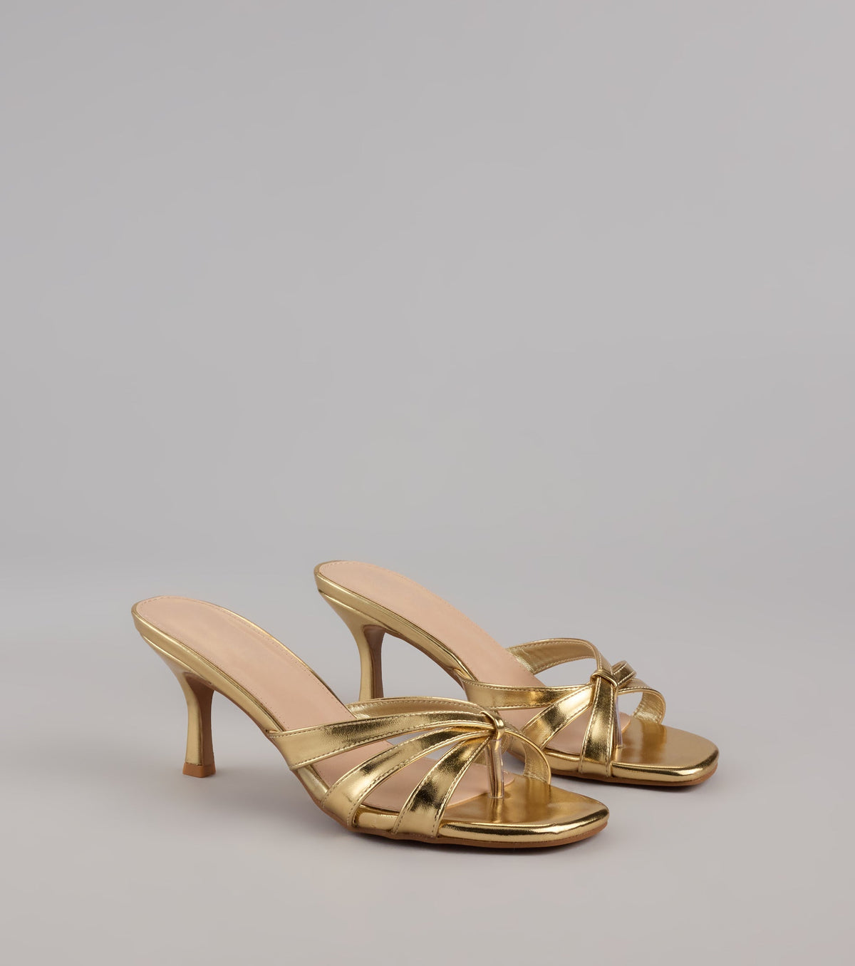 Style made simple with the Shine Bright Metallic Thong Kitten Heels, trendy women’s shoes that take your outfit from basic to bold in one step.