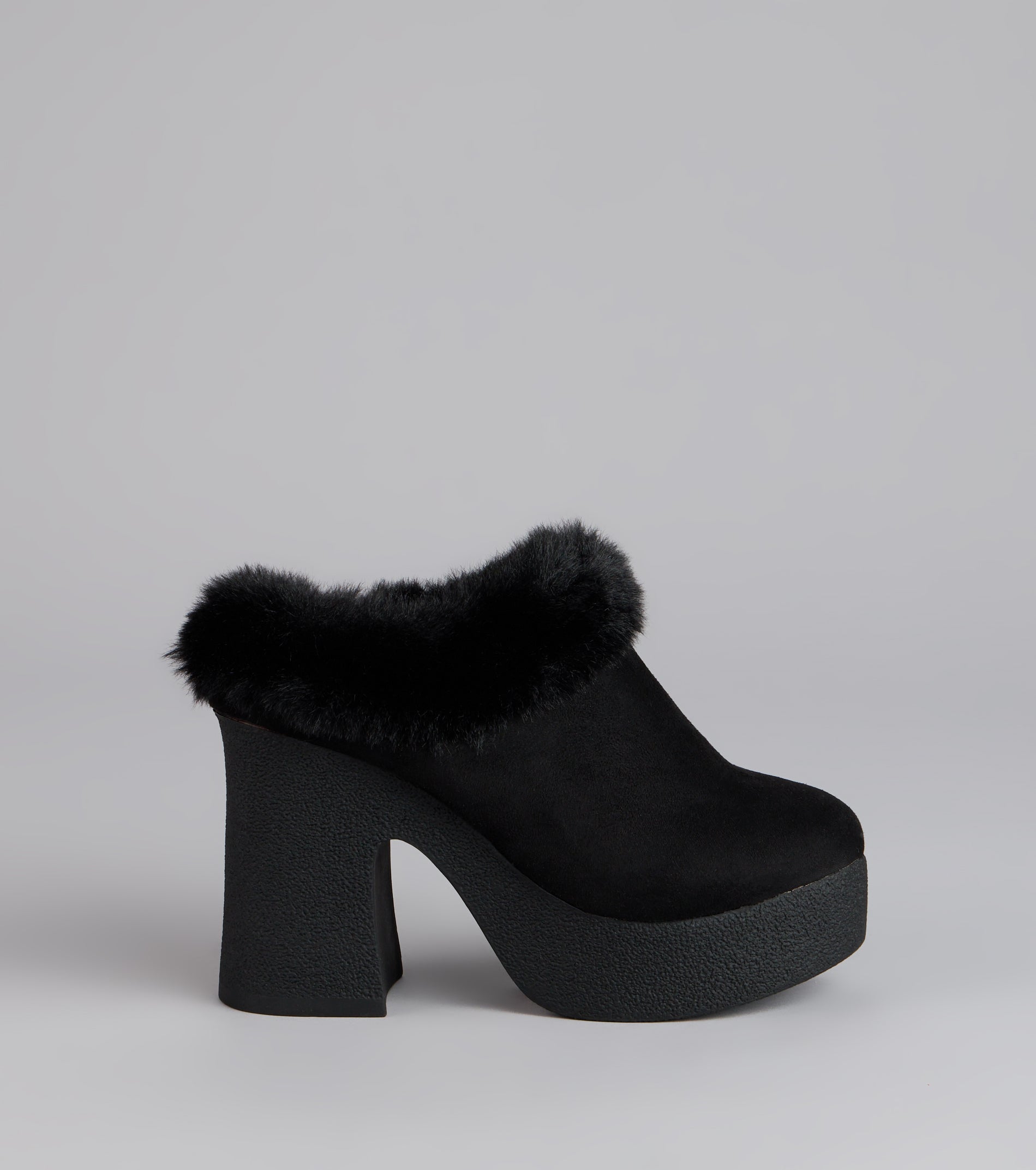 Style made simple with the Fuzzy Feel Chunky Clog Mules in black, trendy women’s shoes that take your outfit from basic to bold in one step.