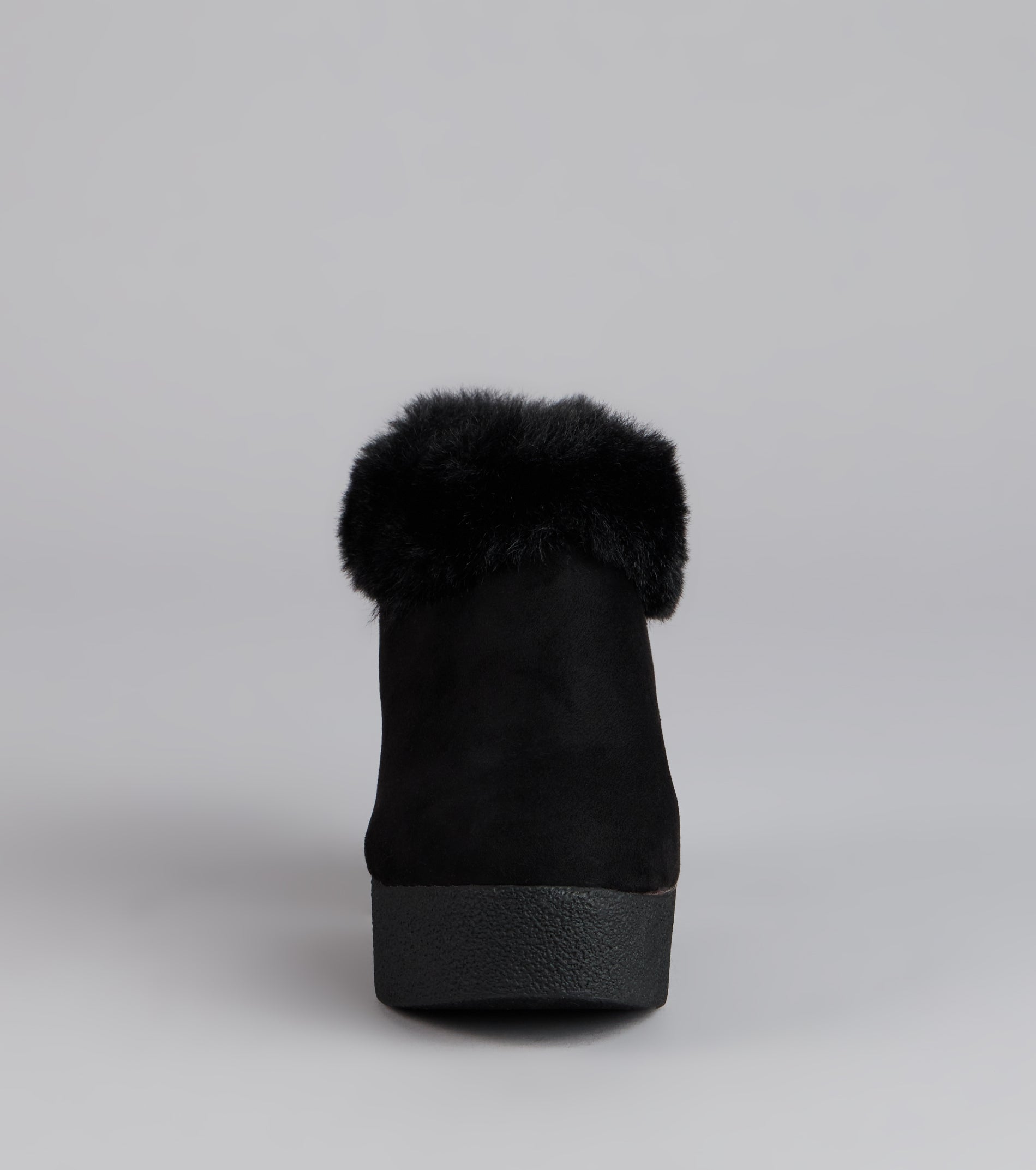 This black piece brings trend-right energy to the Fuzzy Feel Chunky Clog Mules, perfect for fall outfits that stand out.