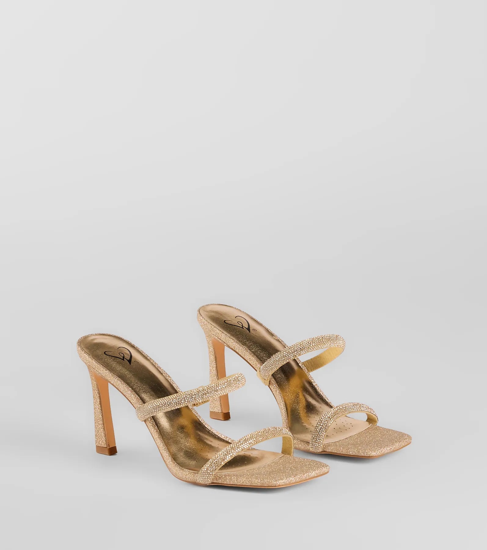 Style made simple with the Classy Luxe Rhinestone Strappy Stiletto Mules in gold, trendy women’s shoes that take your outfit from basic to bold in one step.