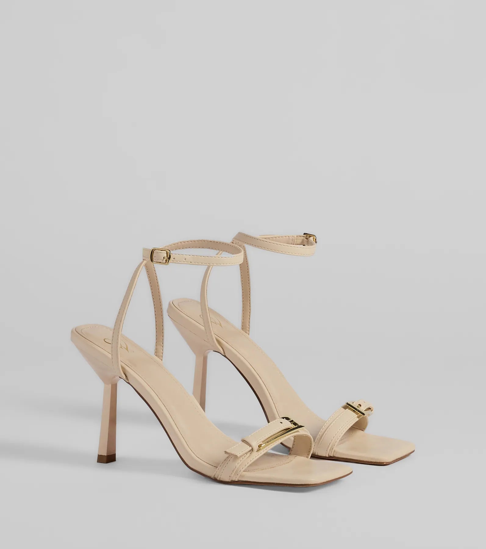Style made simple with the Buckled Up Stiletto Heels in ivory, trendy women’s shoes that take your outfit from basic to bold in one step.