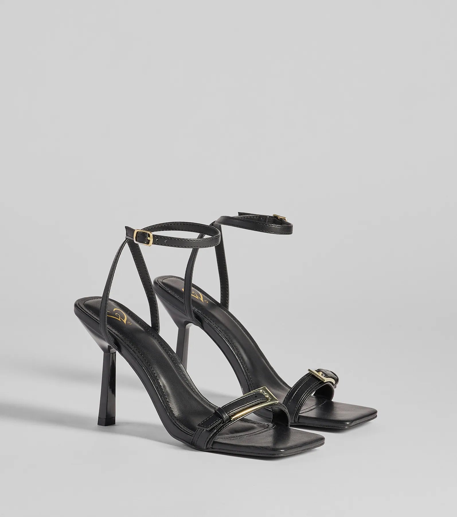 Style made simple with the Buckled Up Stiletto Heels in black, trendy women’s shoes that take your outfit from basic to bold in one step.
