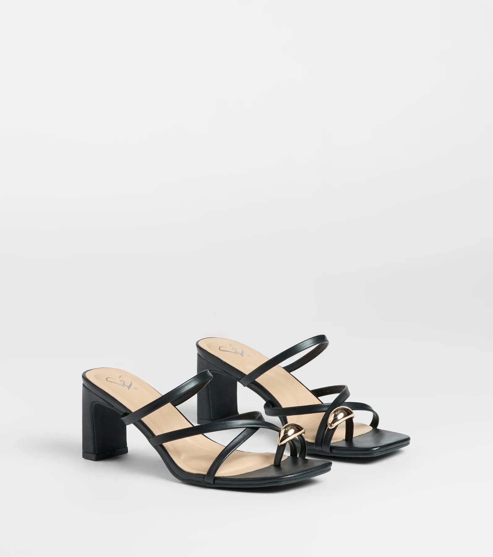Style made simple with the Sweet Attraction Toe Ring Strappy Block Heels in black, trendy women’s shoes that take your outfit from basic to bold in one step.