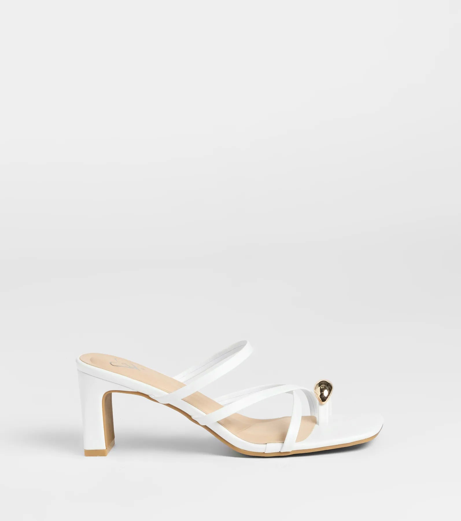 Turn heads in the Sweet Attraction Toe Ring Strappy Block Heels, white heels showcasing a fresh trend or stylish detail made to elevate your full Windsor fit.