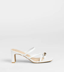 Turn heads in the Sweet Attraction Toe Ring Strappy Block Heels, white heels showcasing a fresh trend or stylish detail made to elevate your full Windsor fit.