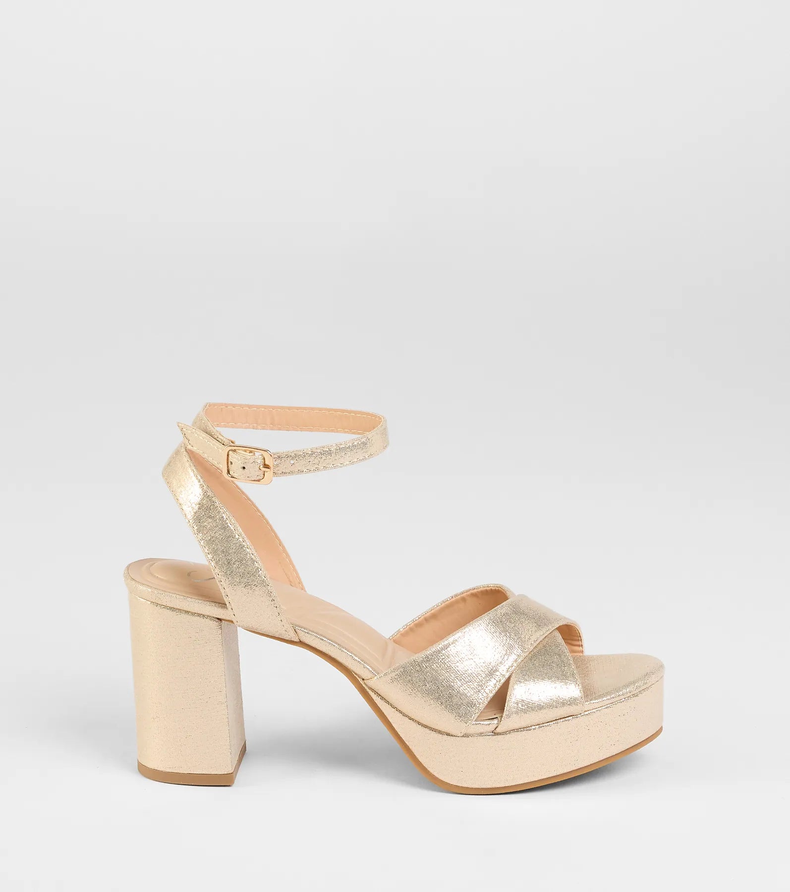 Get inspired with the Special Surprise Criss Cross Platform Block Heels, a feed-worthy gold piece that’s part of Windsor's updated and curated women’s clothing edit packed with must-have fall outfit ideas.