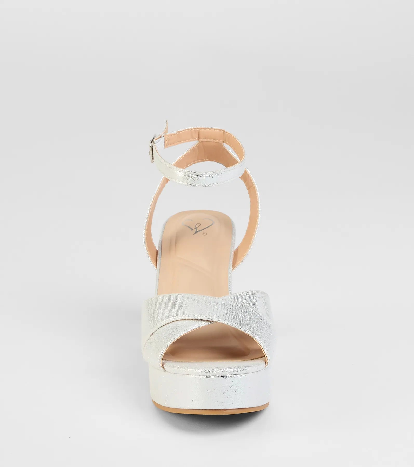 Style made simple with the Special Surprise Criss Cross Platform Block Heels in silver, trendy women’s shoes that take your outfit from basic to bold in one step.