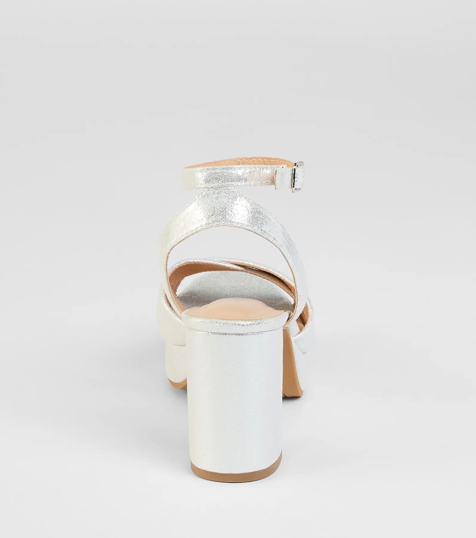 Get inspired with the Special Surprise Criss Cross Platform Block Heels, a feed-worthy silver piece that’s part of Windsor's updated and curated women’s clothing edit packed with must-have fall outfit ideas.